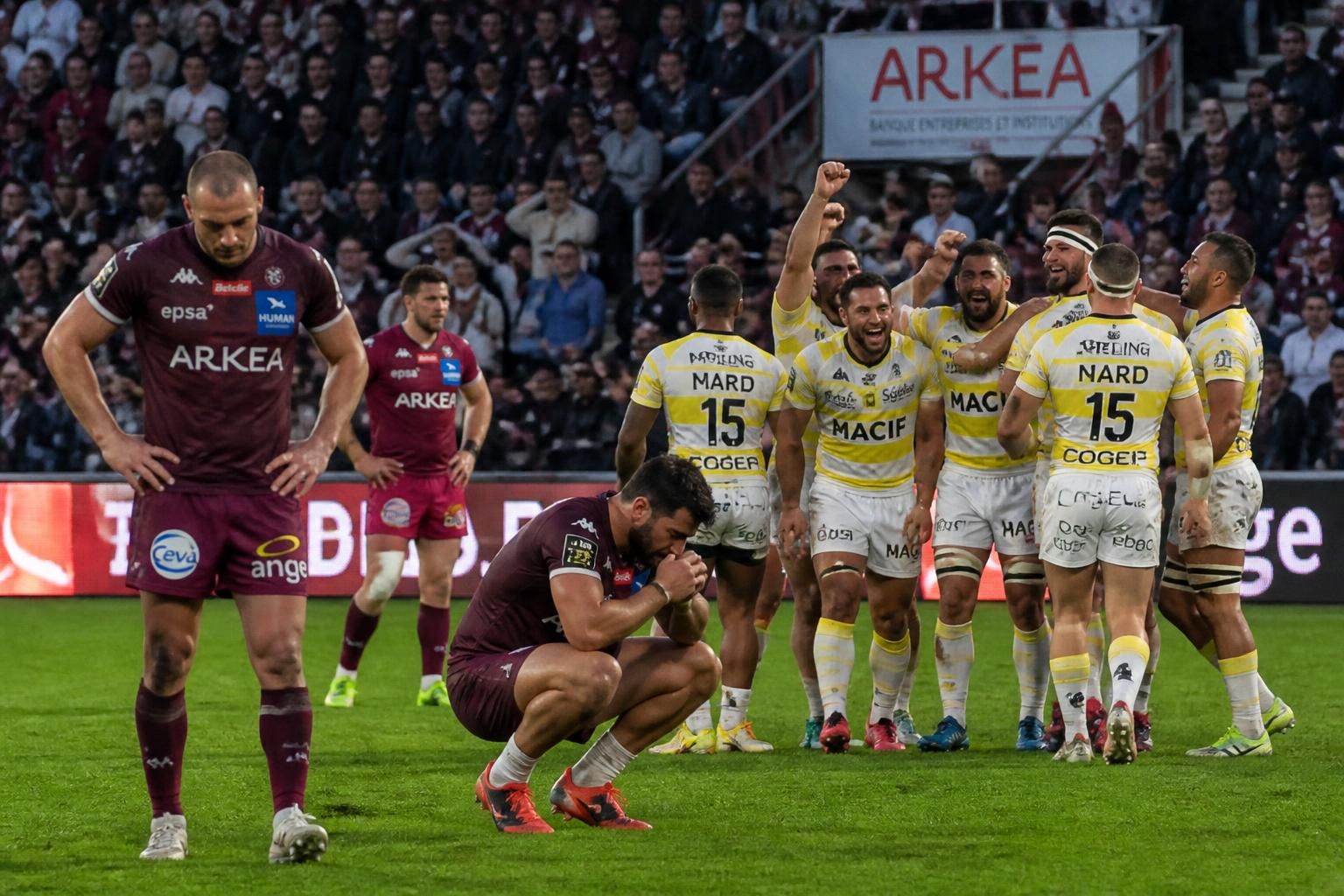 dramatic rugby showdown as bordeaux-bègles are eliminated from the top 14, while la rochelle secures their place in the playoffs with a thrilling victory.