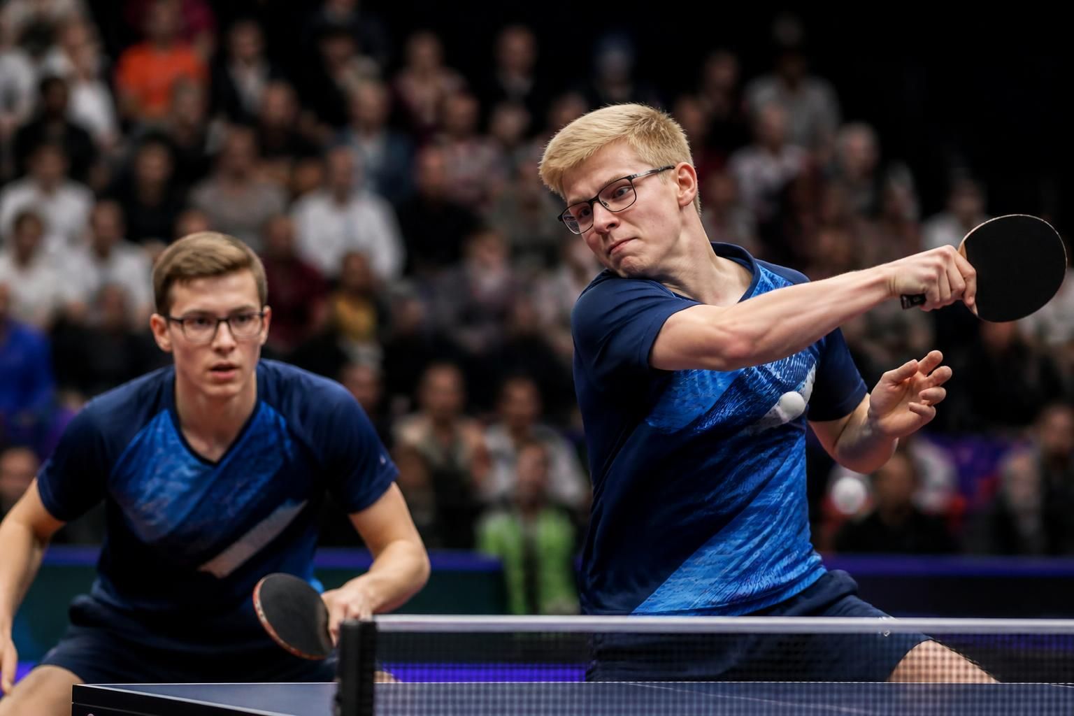 experience the intense table tennis thriller as félix lebrun and grégoire jean make a surprising and thrilling journey into the doubles semifinals with their skill and determination.