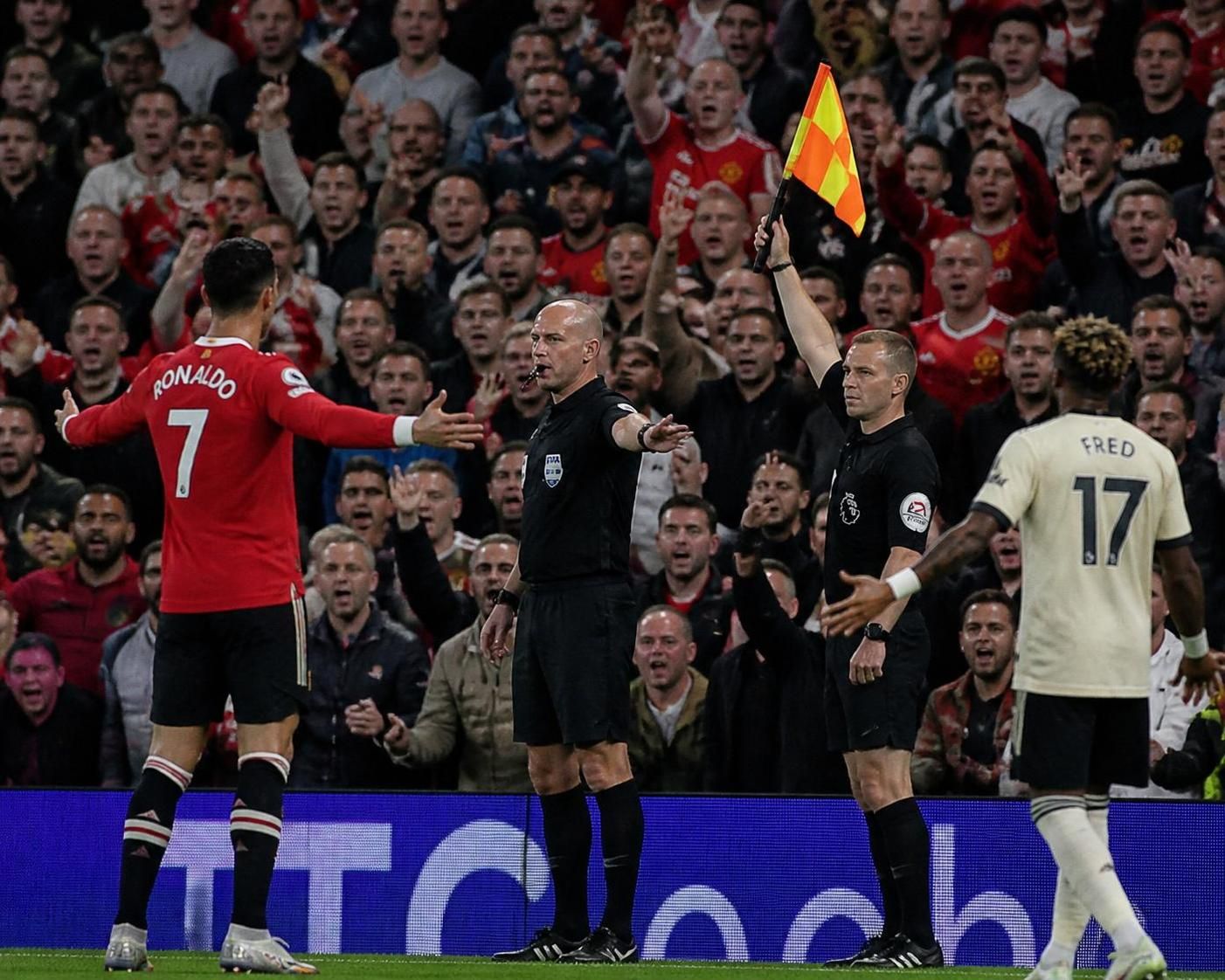 an english expert harshly criticizes the assistant referee for making two crucial mistakes that negatively impacted the game, sparking controversy and debate.